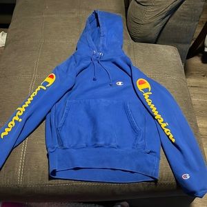 Champion blue sweatshirt, lettering on the side